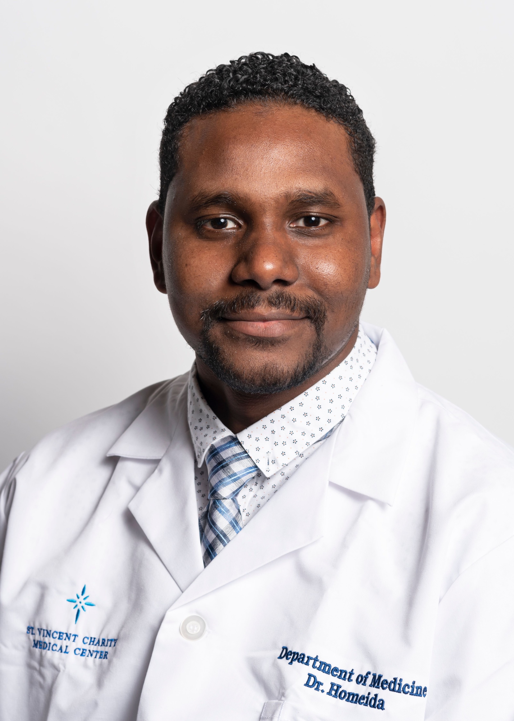 Dr. Mohamed Homeida - Board Director
